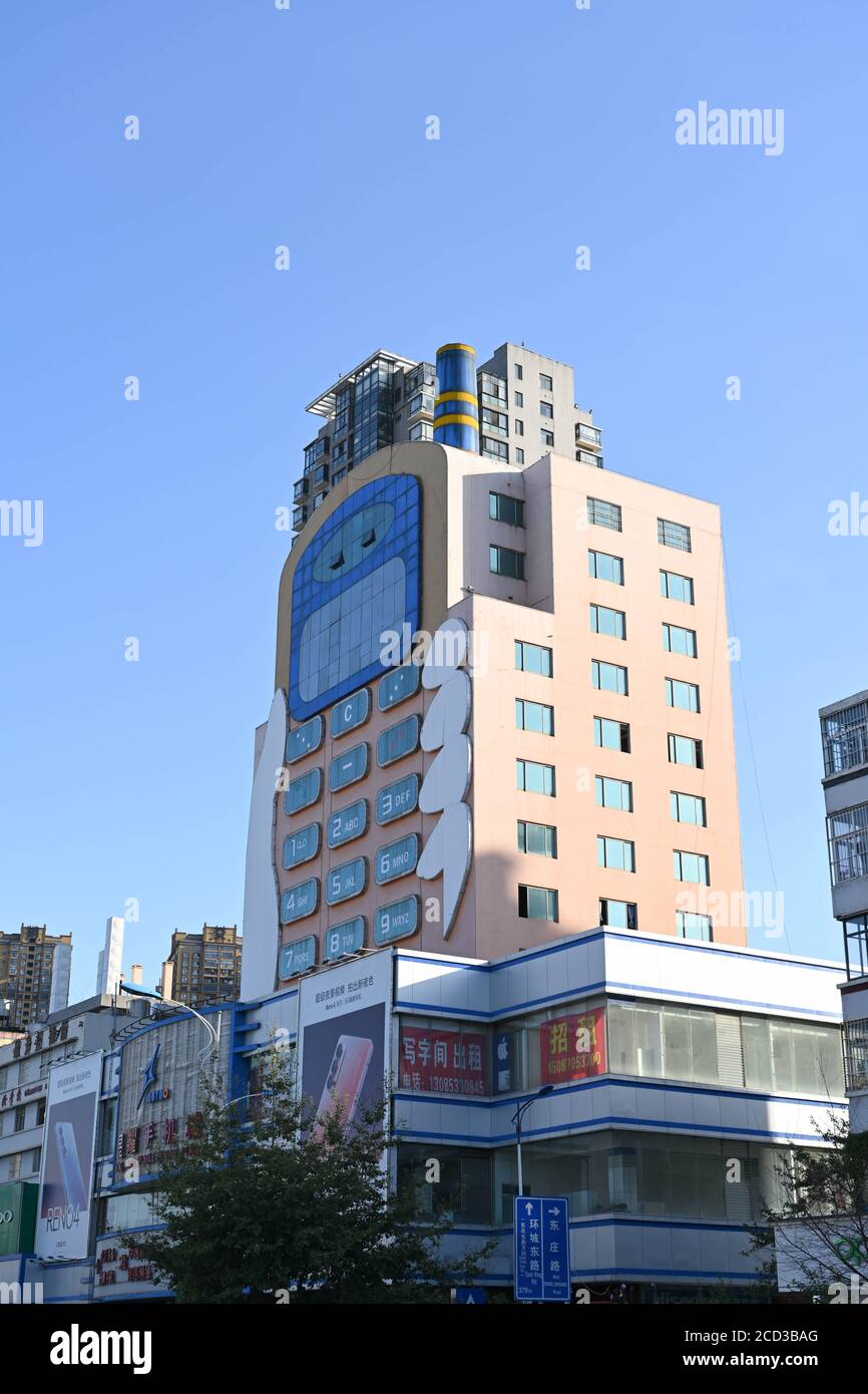 Luftaufnahme des 11-stöckigen 'Handy-Gebäudes' im Stil eines großen Bruders, das war Erbaut in den 1990er Jahren als Einkaufszentrum mit mobilen Telefone und Mob Stockfoto