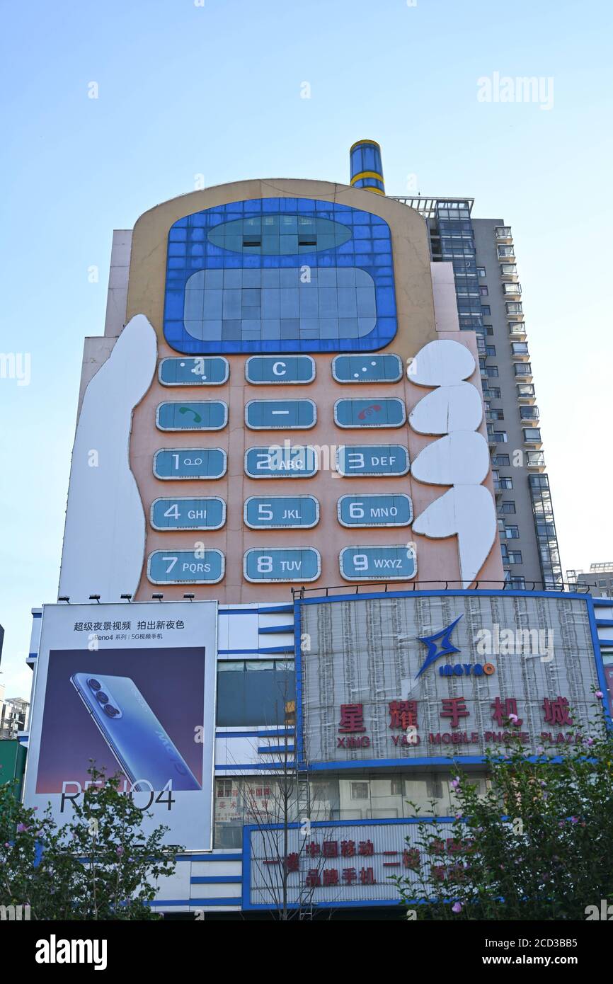 Luftaufnahme des 11-stöckigen 'Handy-Gebäudes' im Stil eines großen Bruders, das war Erbaut in den 1990er Jahren als Einkaufszentrum mit mobilen Telefone und Mob Stockfoto