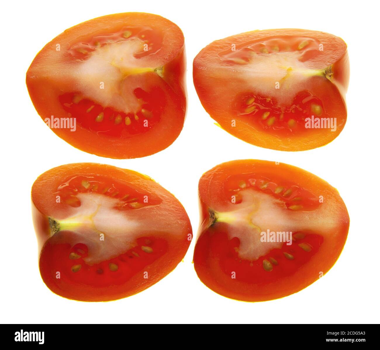 Vier Viertel einer Tomate Stockfoto