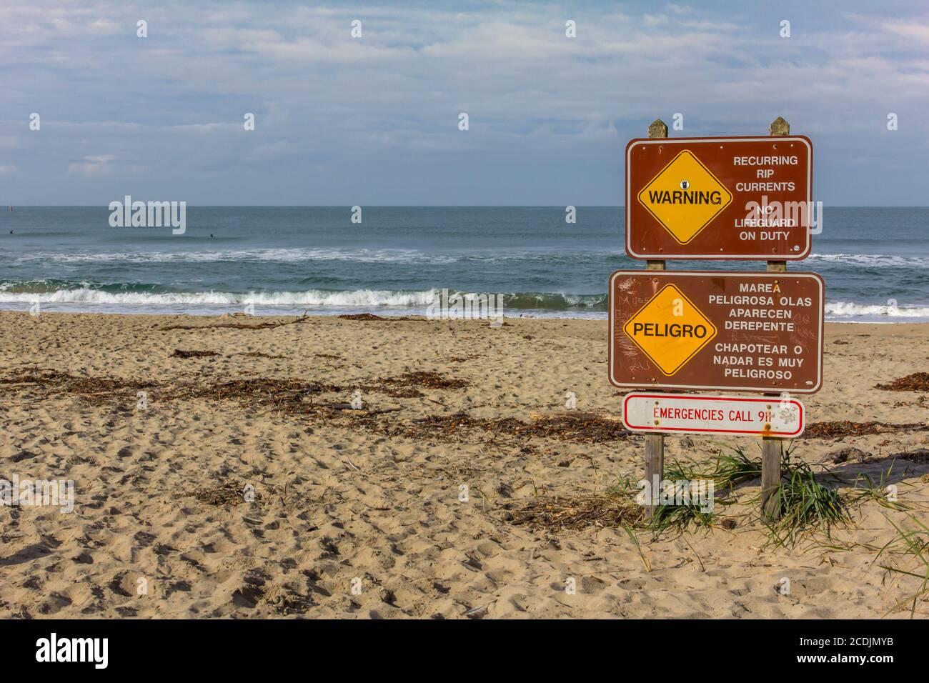 Schild warnt vor Rippströmen Stockfoto
