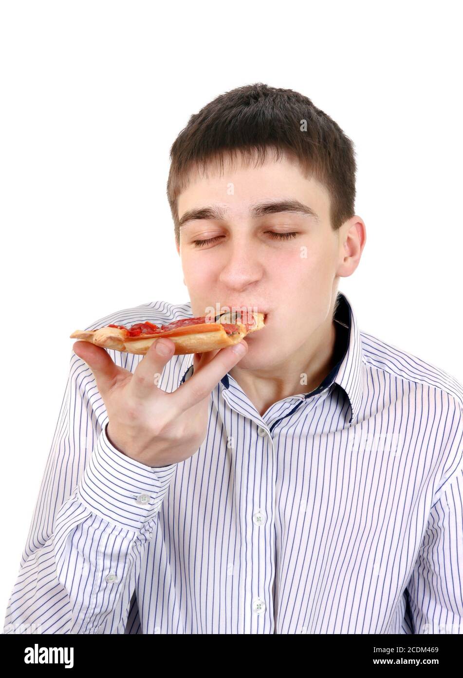 Teenager mit Pizza Stockfoto