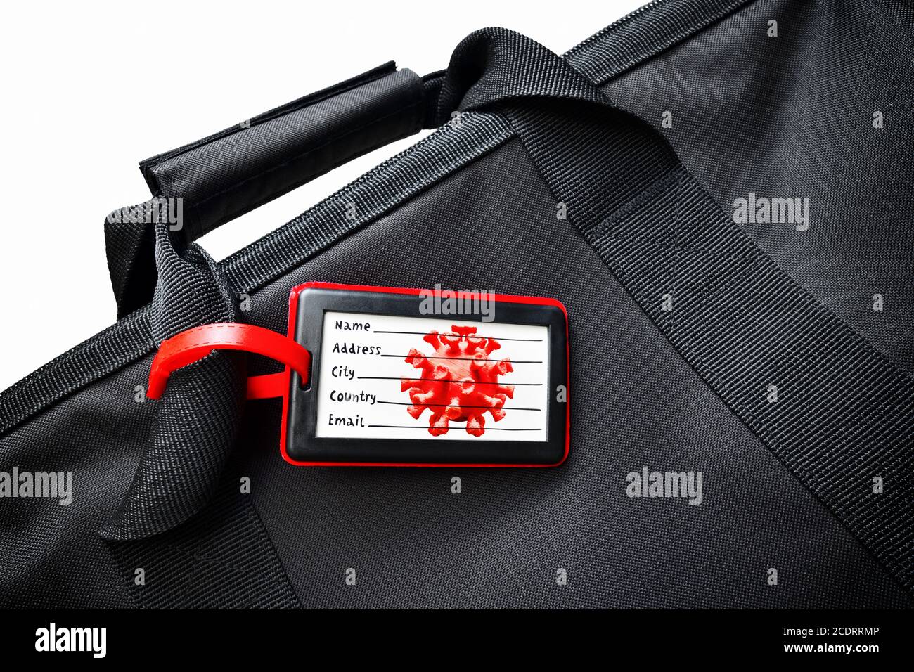 Reisetasche und Coronavirus-Adressschild, COVID-19 Reisewarnung Stockfoto