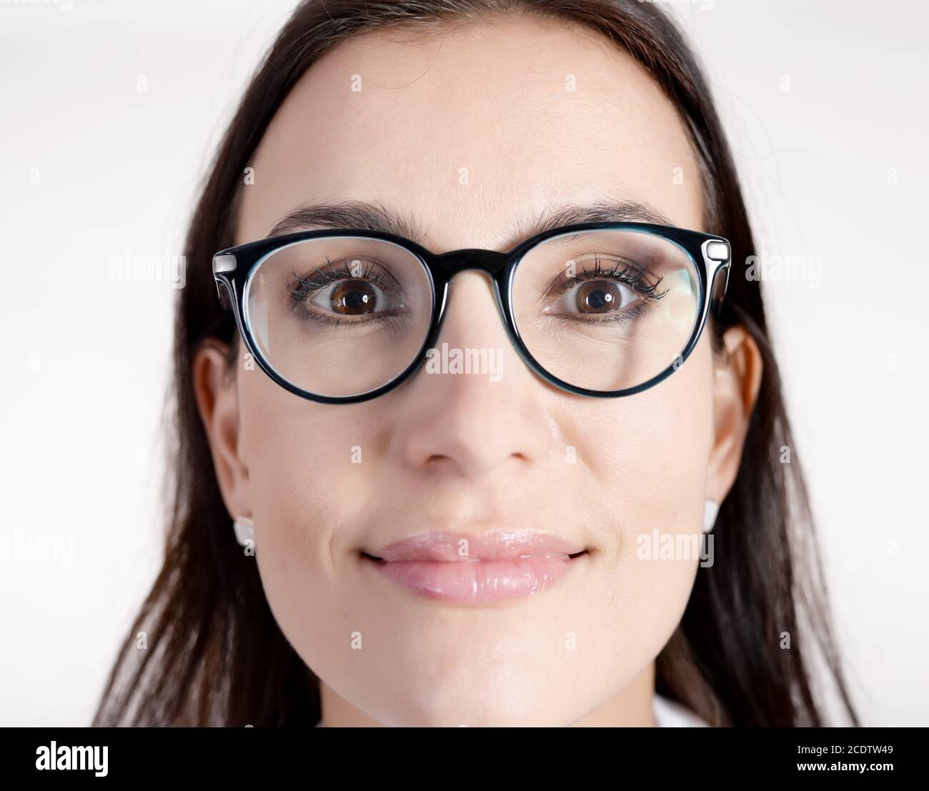 junge Frau mit Brille Stockfoto