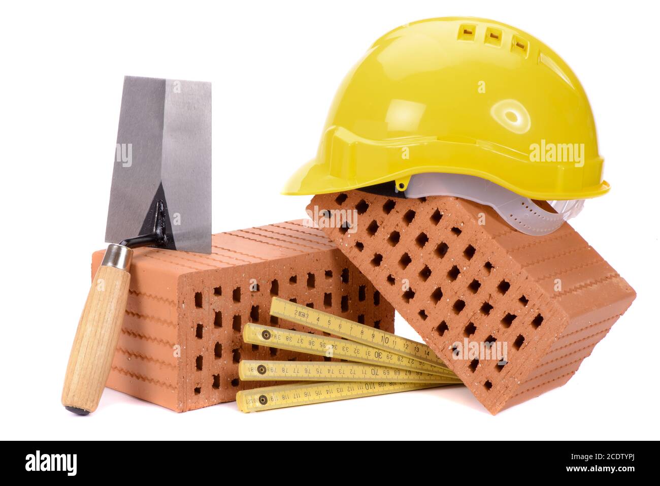 Haus bauen mit Backstein, Werkzeuge, Planen und Modell Haus Stockfoto