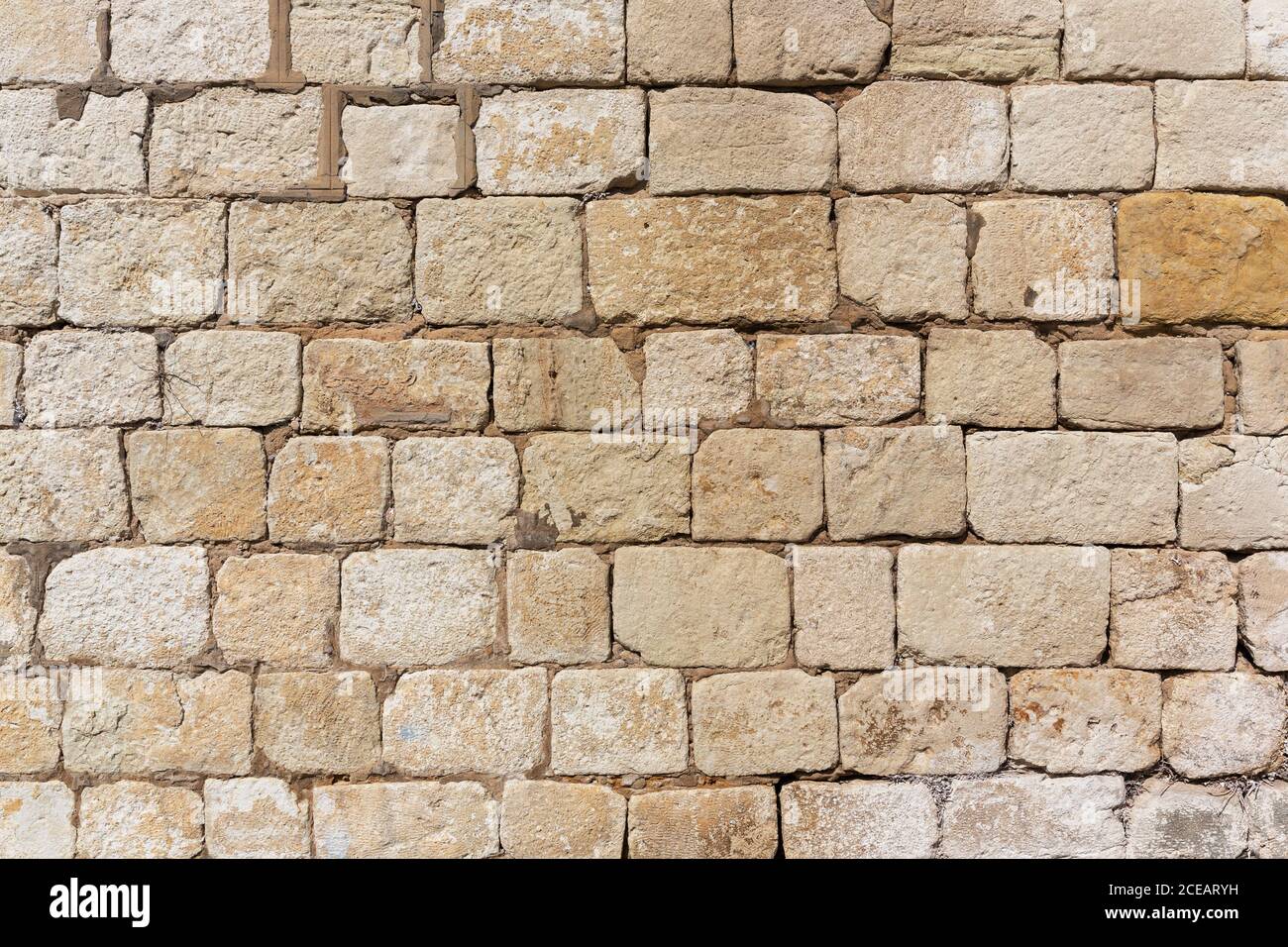 Wandstruktur aus braunem Stein Stockfoto