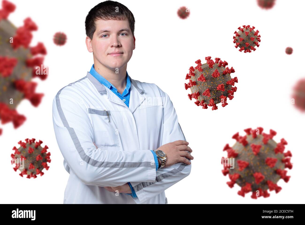 Arzt und Virus auf weißem Hintergrund Stockfoto