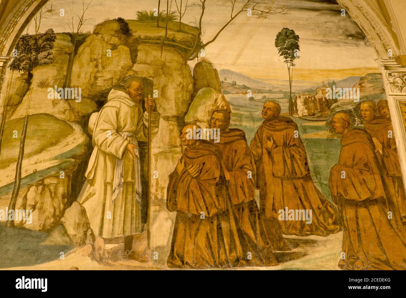 Abtei von Monte Oliveto Maggiore, Siena, Toskana - Italien, 7. März 2019: Fresko mit dem Heiligen Benedikt, der die Idee einer Gemeinschaft monasticis reift Stockfoto