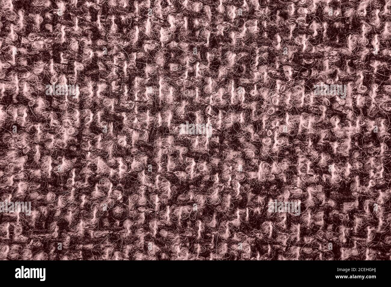 tweed wie Textur. Strukturierte Melange Polsterung Stoff Hintergrund kopieren Raum. Textur von Köperfarbe. ROSENQUARZ MODE und HOME Farbe. Farbe des Yea Stockfoto