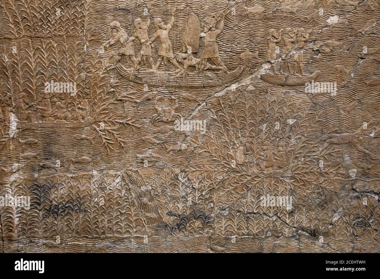 Alte assyrische Steinschnitzerei mit Schrift, BRITISH MUSEUM, London, UK. Wahlkampf im Südirak, Assyrisch, etwa 640-620 v. Chr. von Ninive Stockfoto