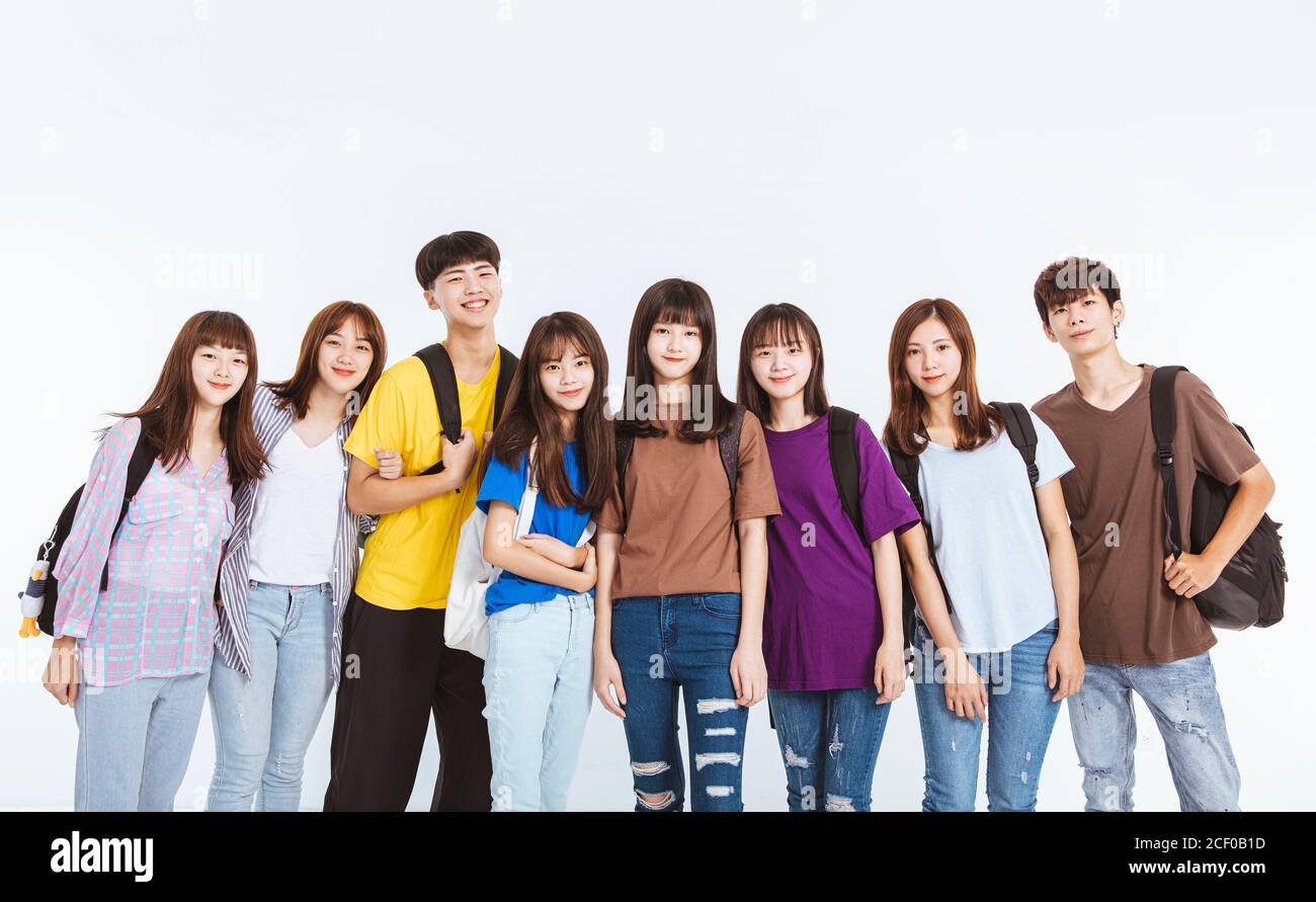 Glückliche Teenager Studentengruppe zusammen stehend Stockfoto