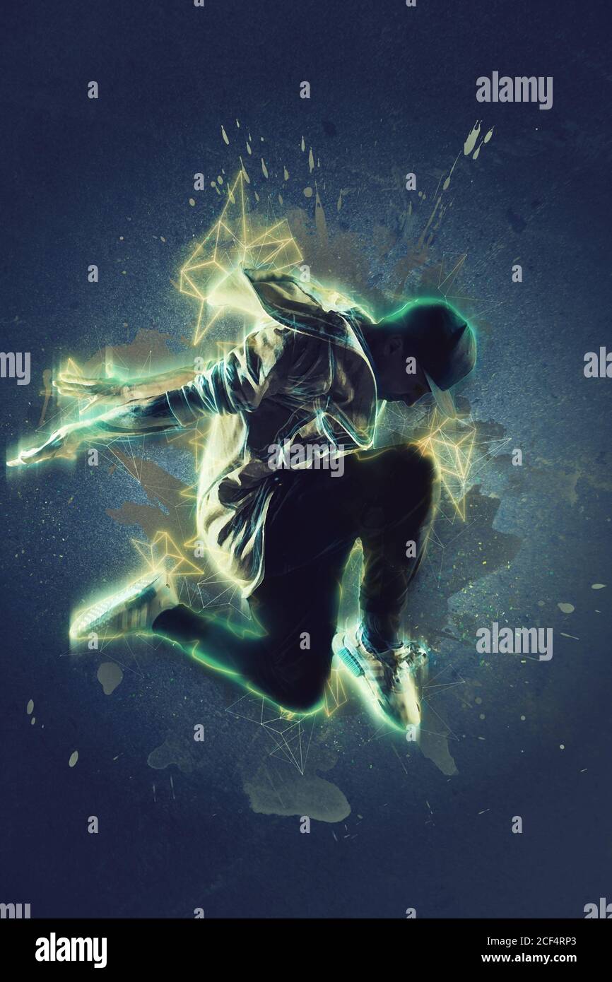 Springende junge männliche Tänzerin auf grauem Hintergrund Stockfoto