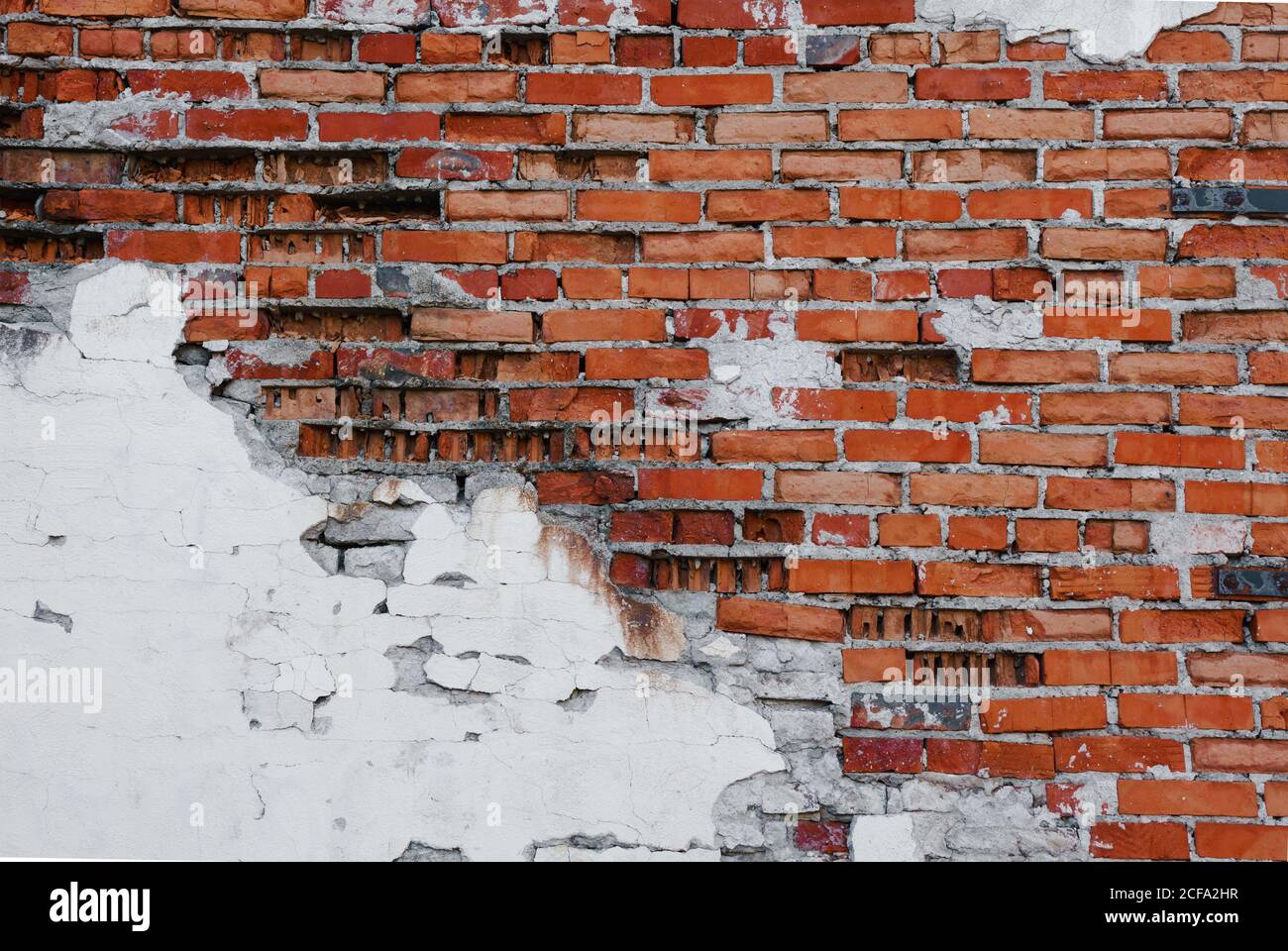 Grunge Backstein Wand mit bröckelnden Putz, Ziegel Textur, abstrakten Hintergrund Stockfoto