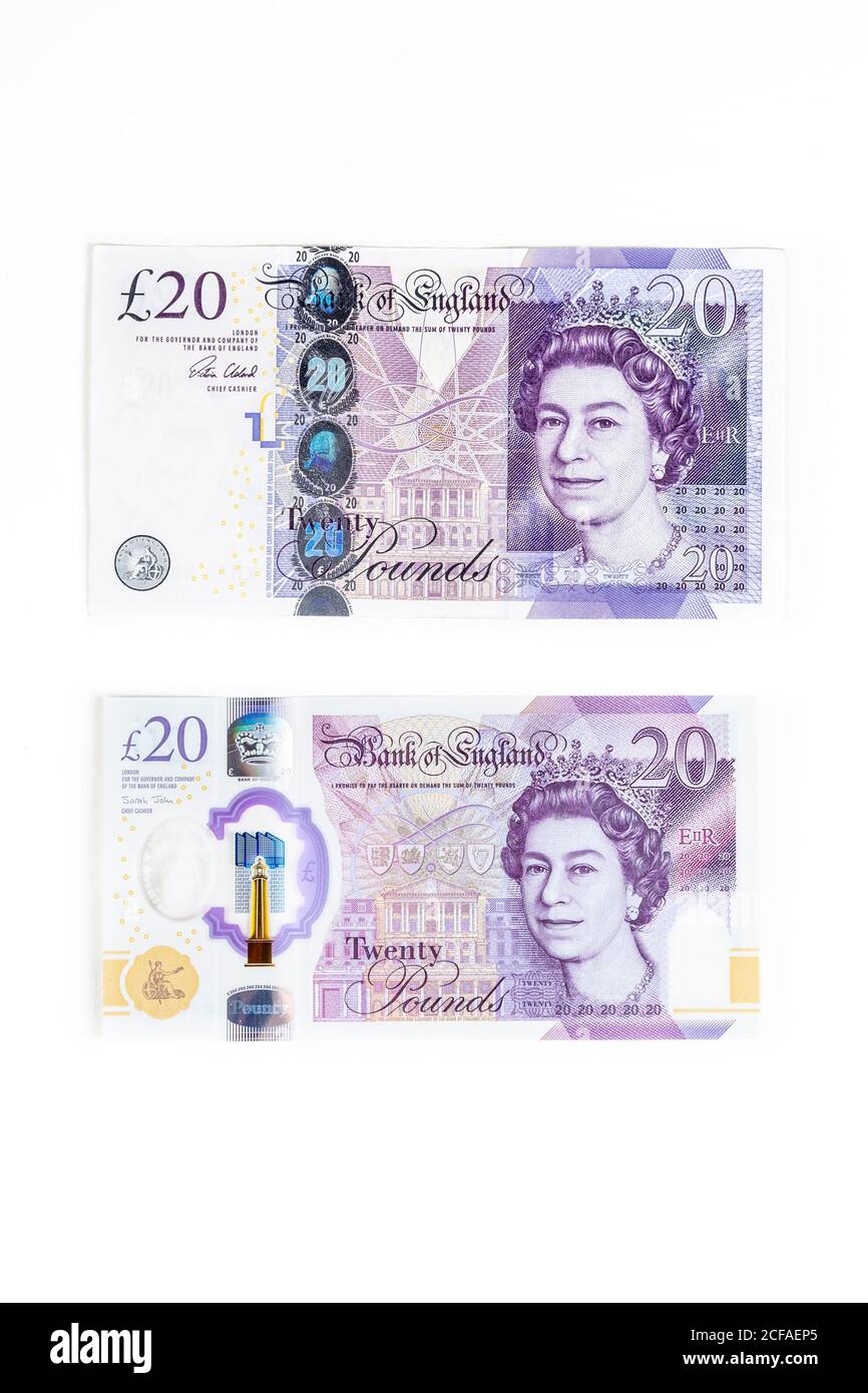 Altes Papier 20 Pfund Note Seite an Seite mit dem Neuer Polymerhinweis Stockfoto