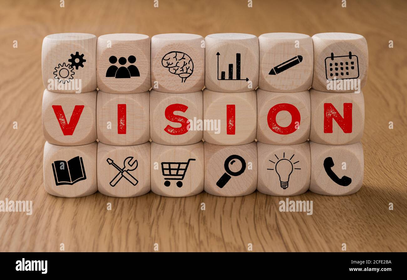 Würfel mit Symbolen und dem Wort Vision Stockfotografie - Alamy