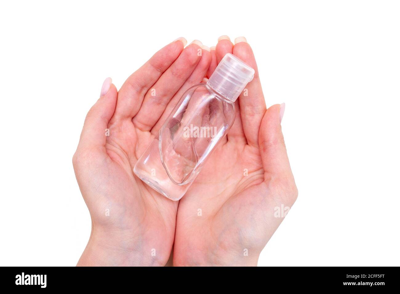 Flasche mit antibakteriellen antiseptischen Gel in der Hand isoliert auf weiß Stockfoto