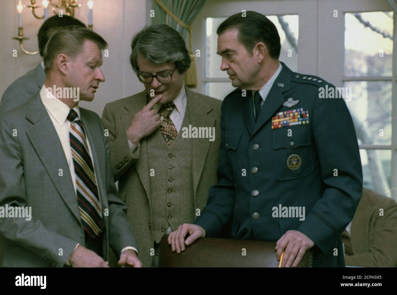 'Zbigniew Brzezinski, David Aaron und General David Jones Ca. 12/20/1978' Stockfoto