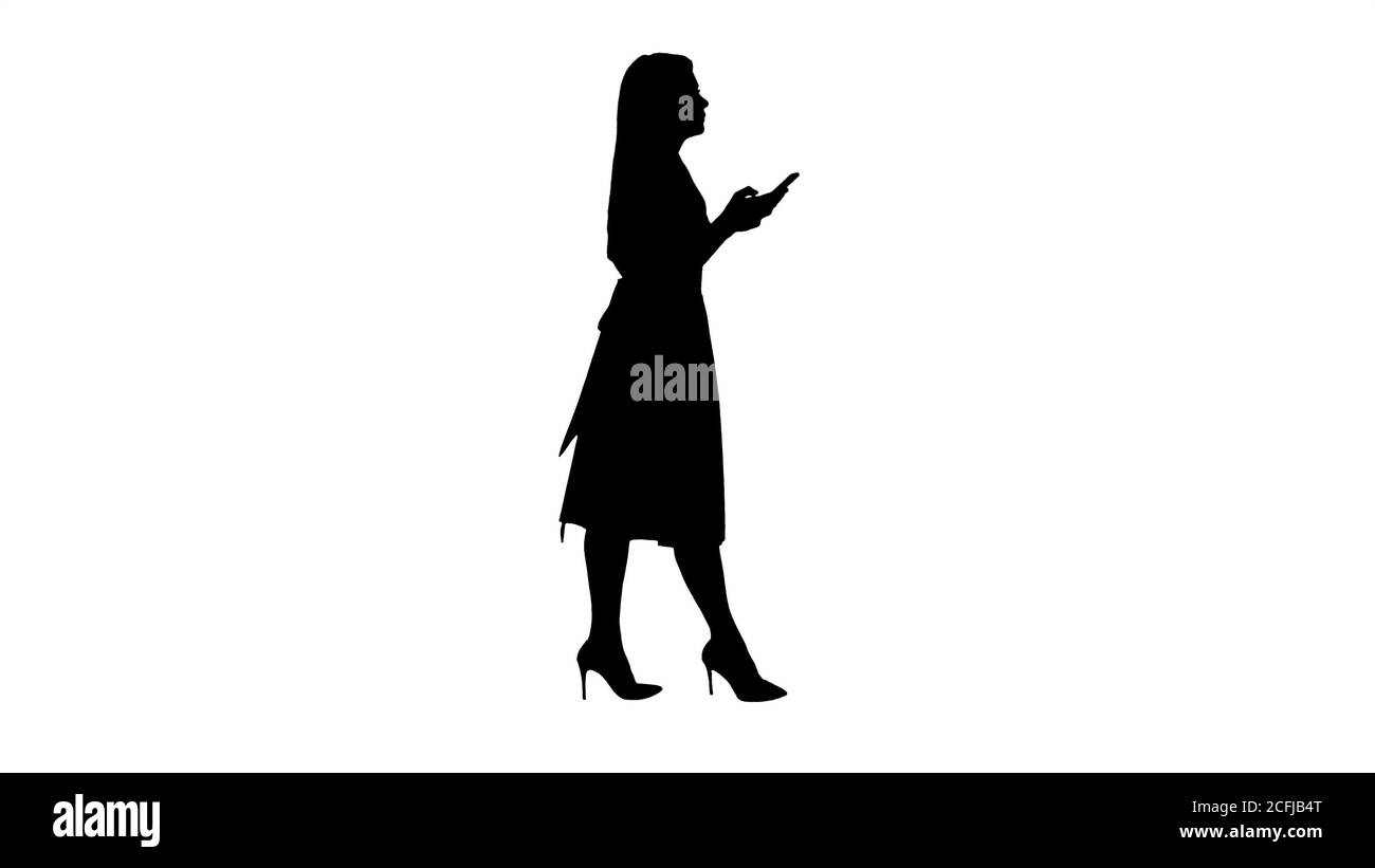 Silhouette ziemlich blonde Frau mit Handy SMS-Nachricht. Stockfoto