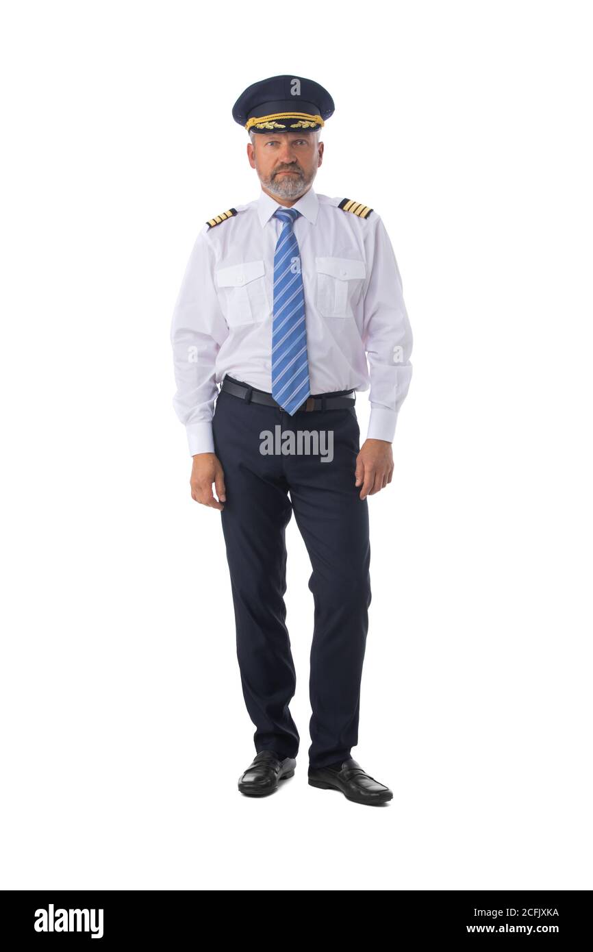 Airline-Pilot trägt die vier Bar Kapitäne Schulterklappen, erster Pilot, Flugzeugkommandant, isoliert auf weißem Hintergrund, voller Länge Porträt Stockfoto