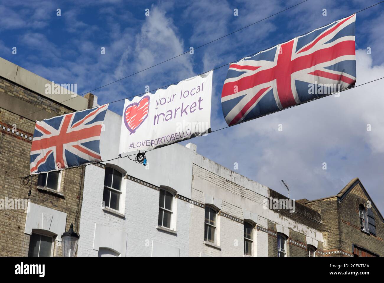 Ihr lokaler Markt, Union Jack Flaggen, Schild, portobello Markt, London Stockfoto