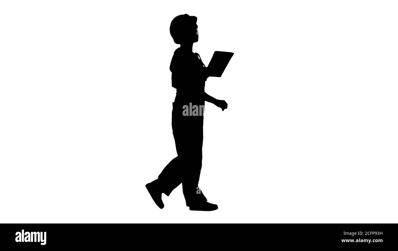 Silhouette Konstruktion Dame mit elektronischen Tablet zu Fuß. Stockfoto