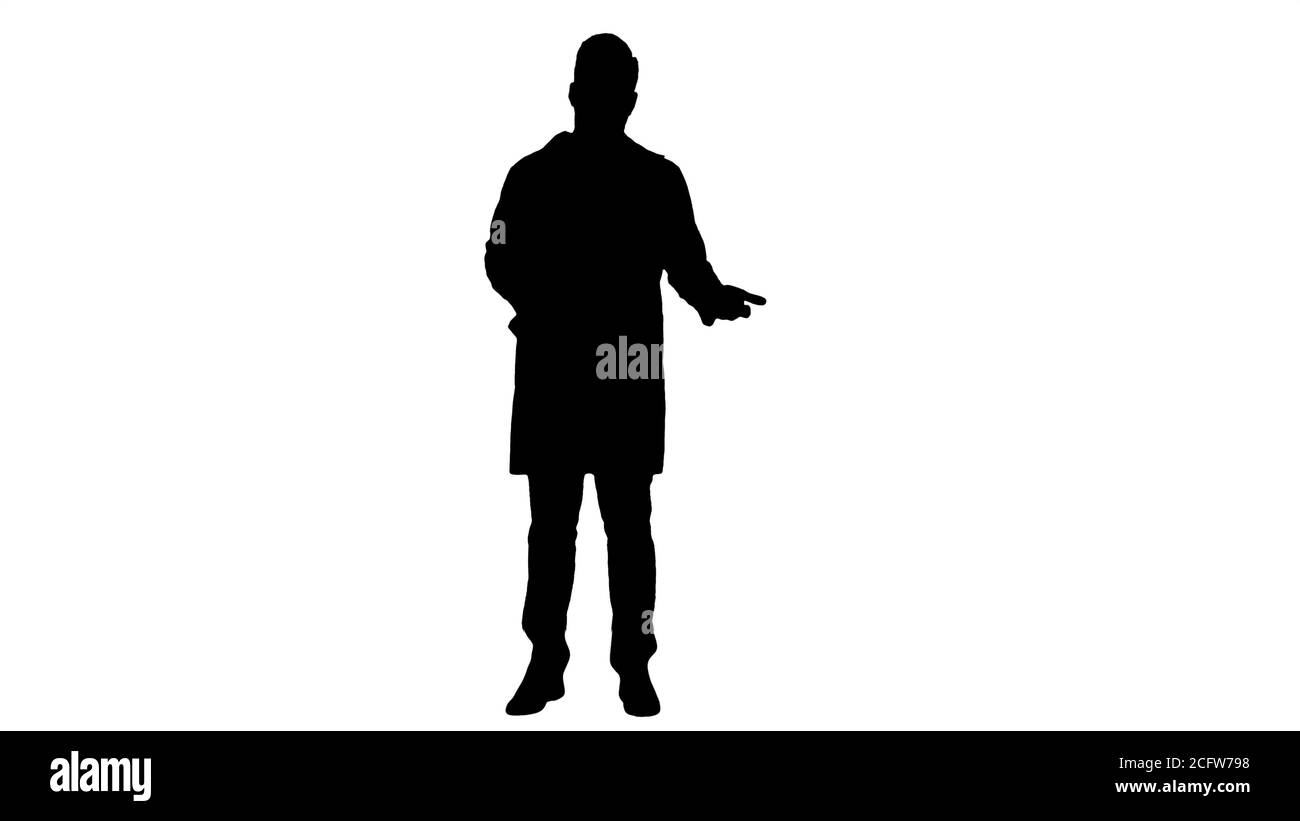 Silhouette Doctor erzählt Röntgenergebnisse an die Kamera. Stockfoto