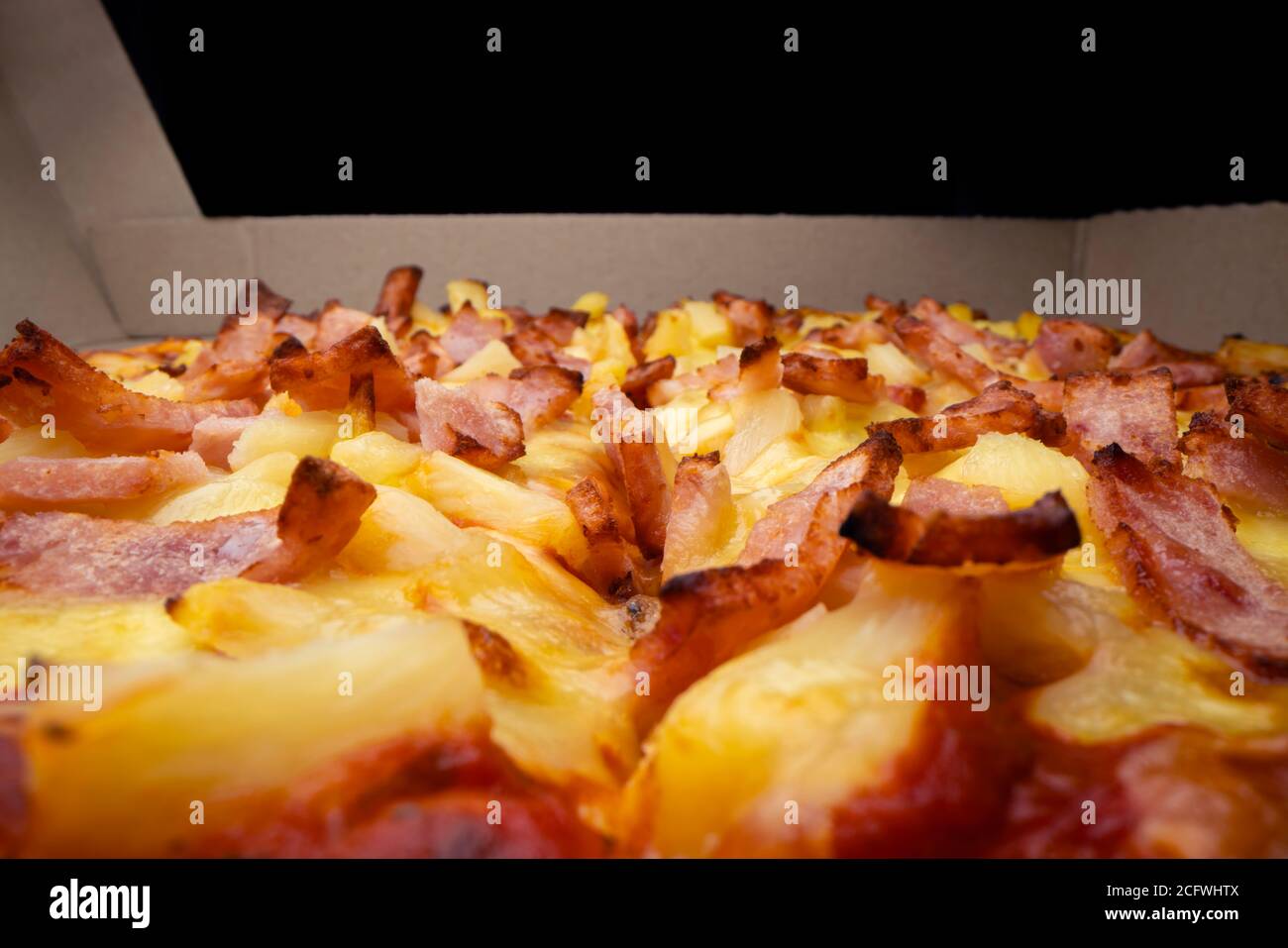 Makroansicht der Pizza zum Mitnehmen Stockfoto