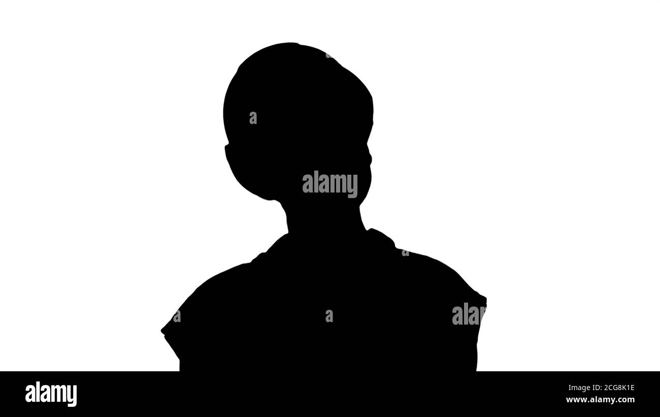 Silhouette Junge Bauarbeiter mit Tablet-Computer präsentiert etwas. Stockfoto