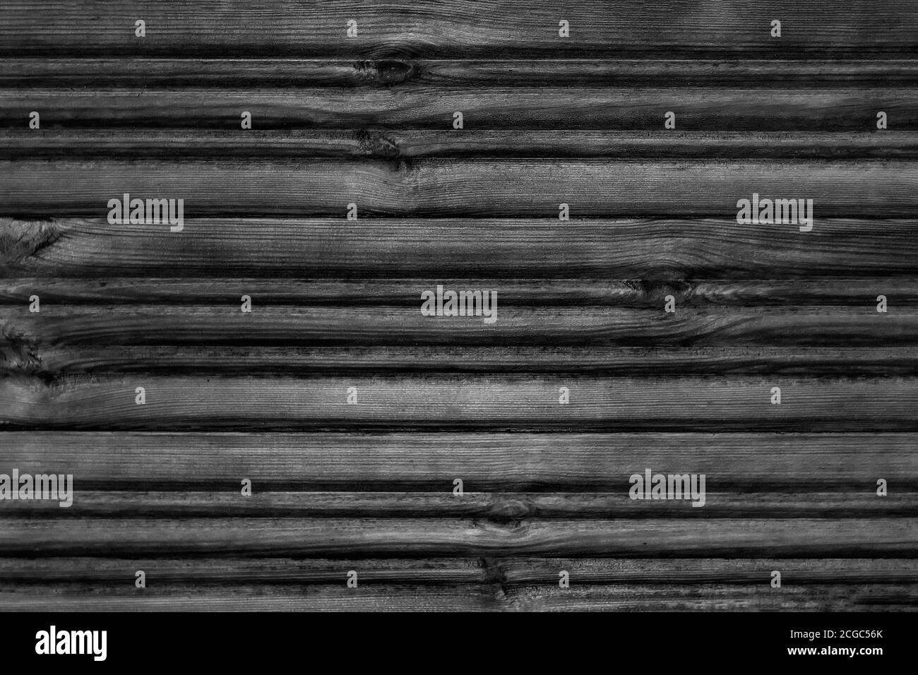 Dunkler strukturierter Hintergrund aus Holz. Blick von vorne Stockfoto