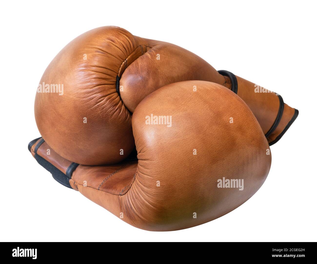 Paar braune Boxhandschuhe aus Leder isoliert auf weiß Stockfoto