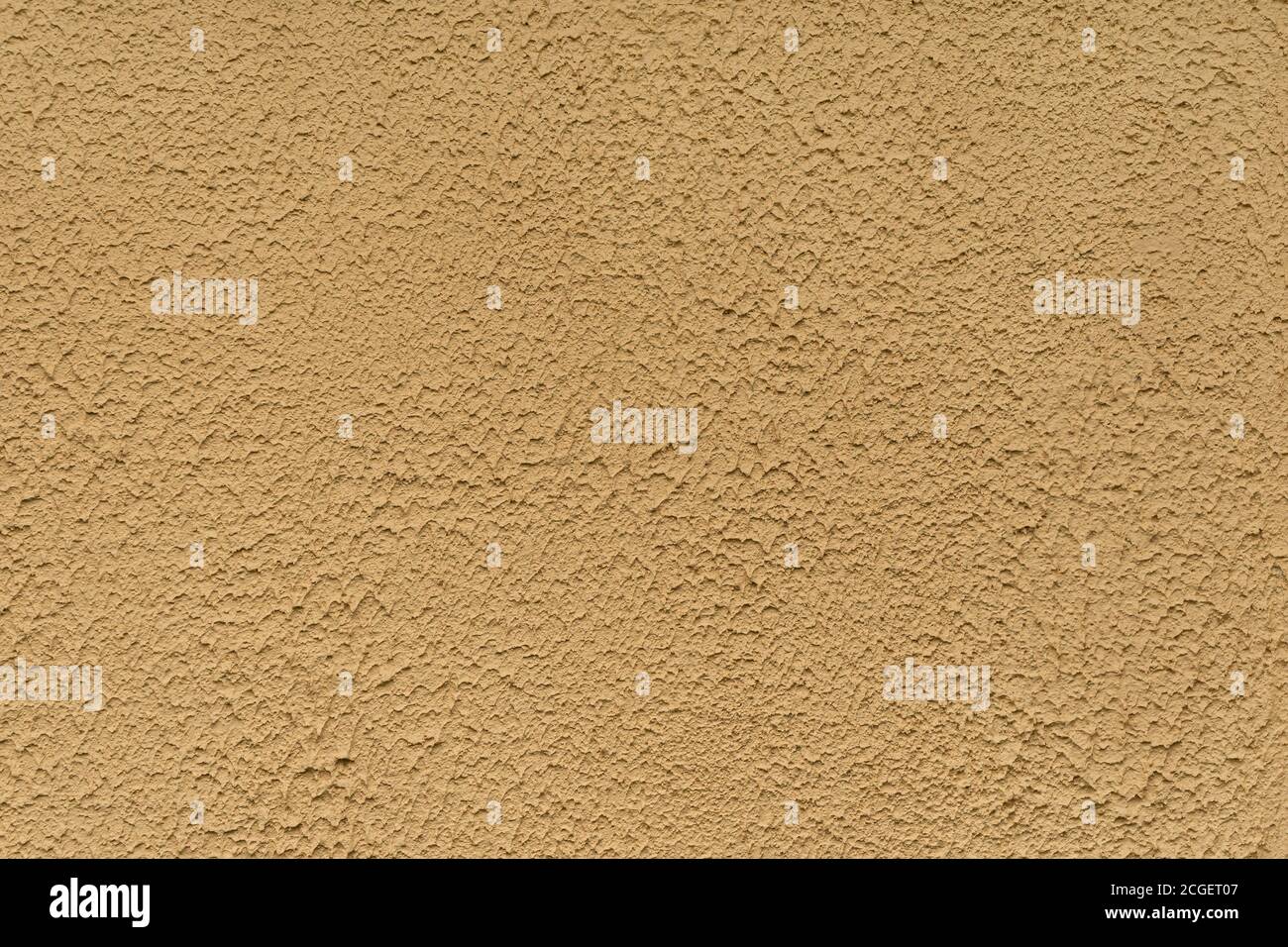 Stuckwandstruktur mit grober Textur. Beige Farbe. Stockfoto