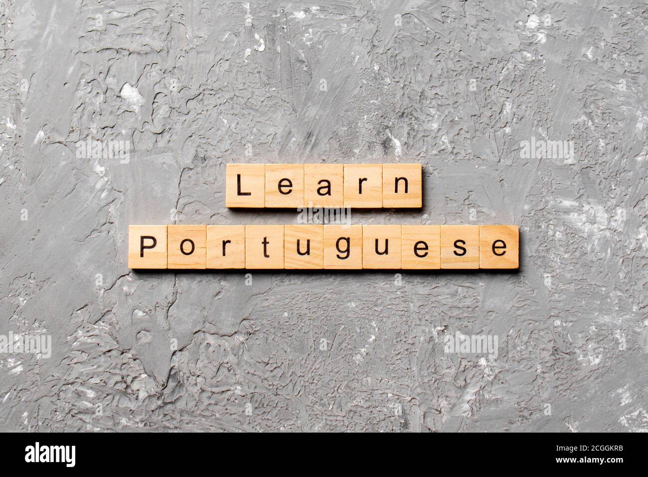 Portugiesische Wort auf Holz Baustein geschrieben lernen. Lernen Sie Portugiesisch text auf Tisch, Konzept. Stockfoto