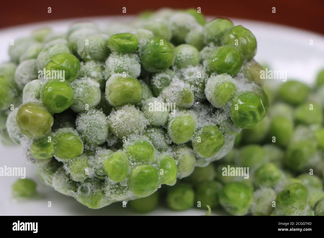 Gefrorene grüne Erbsen, verarbeitete Lebensmittel Stockfoto