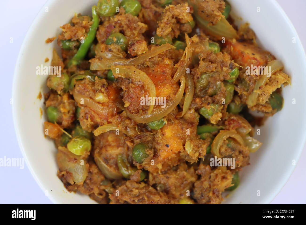 Paneer Sukka oder Paneer mutter Kokosnuss Masala, Paneer grünen Erbsen trocken, Curry mit Quark, indische Küche Stockfoto