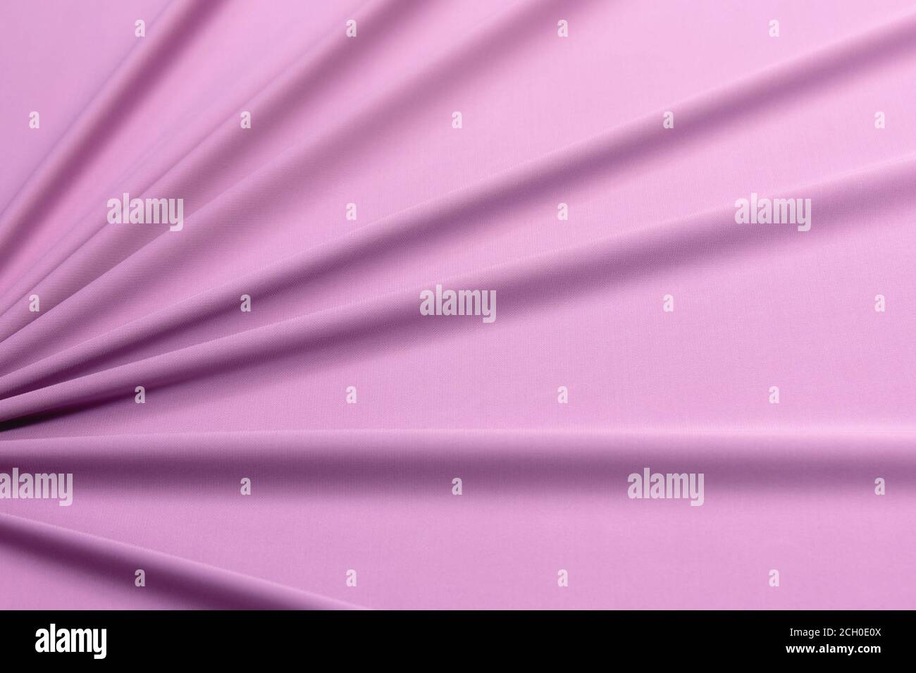 Warme Strickqualität in Pink. Die Textur des Stoffes. Stockfoto