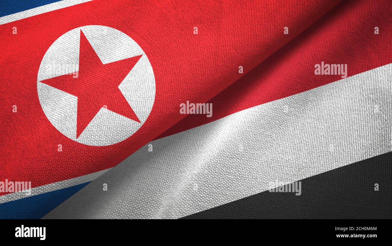 Nordkorea und Jemen zwei Flaggen Textiltuch, Stoffstruktur Stockfoto