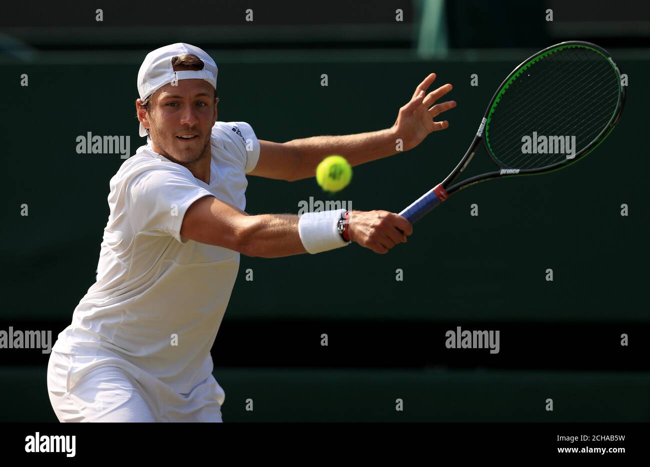 Lucas Pouille im Einsatz gegen Tomas Berdych am 9. Tag der Wimbledon Championships beim All England Lawn Tennis und Croquet Club in Wimbledon. Stockfoto