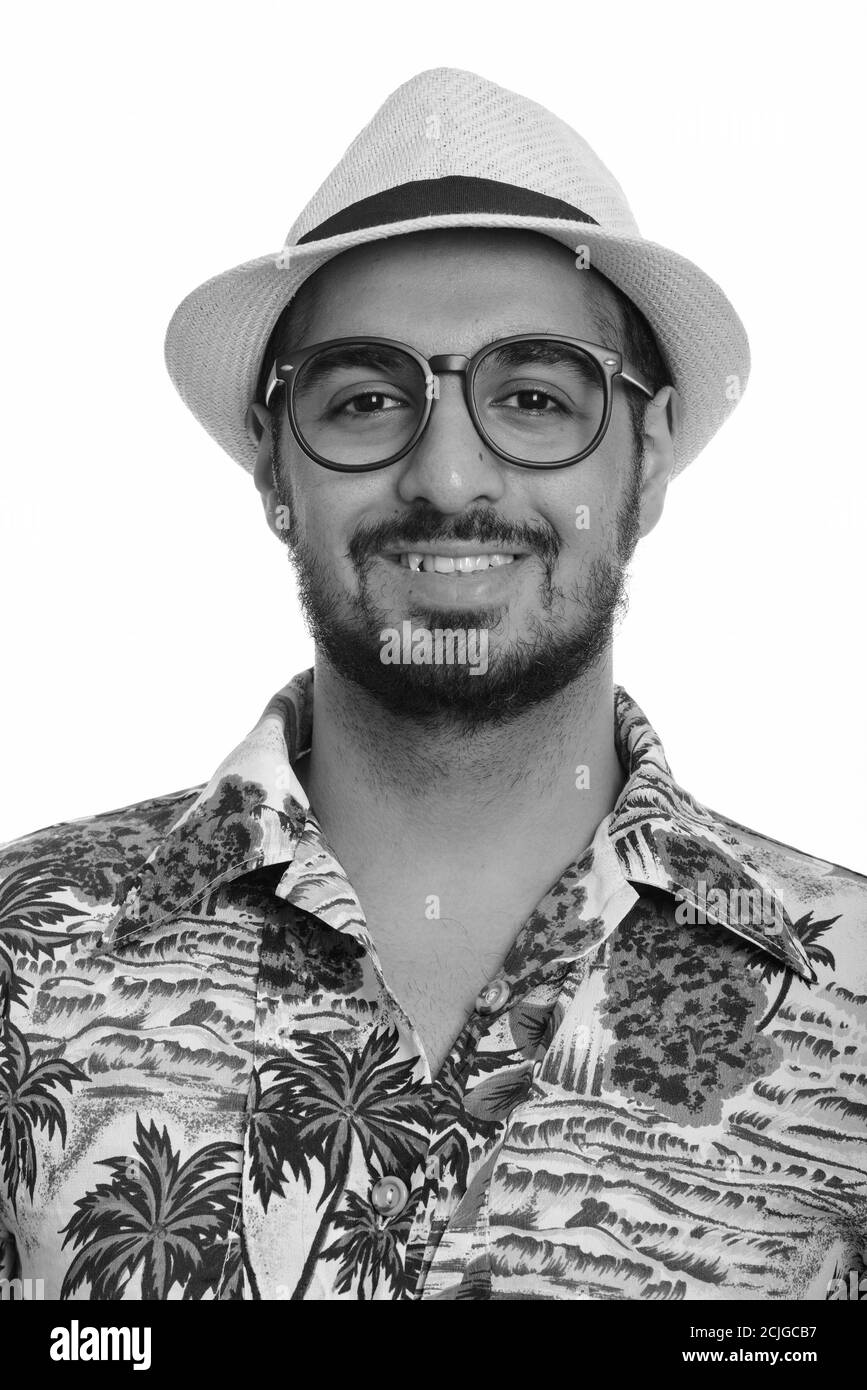 Junge glücklich indischen Mann lächelnd bereit für Ferienhäuser Stockfoto Junge glücklich indischen Mann lächelnd bereit für Ferienhäuser Stockfoto