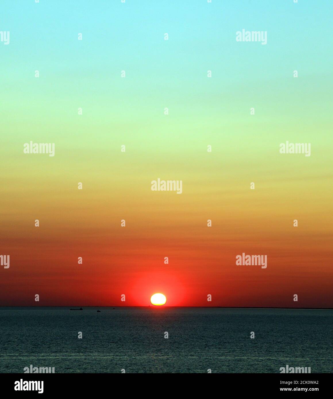 Setting Sun, Over the Wash, Meer, Küste, aus Hunstanton, Norfolk, England, Großbritannien Stockfoto