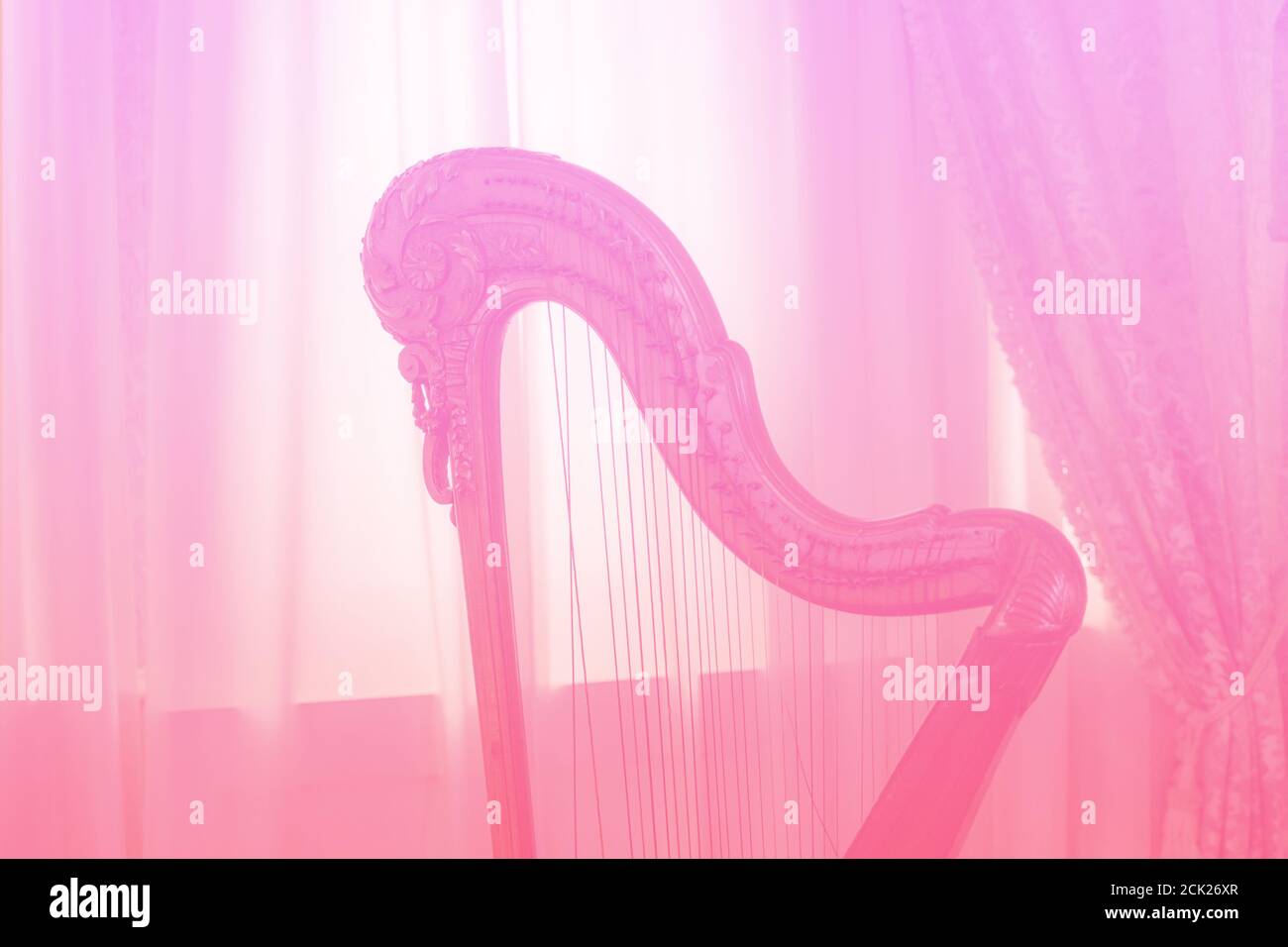 Eine romantische schöne Harfe rosa getönten Foto Stockfoto