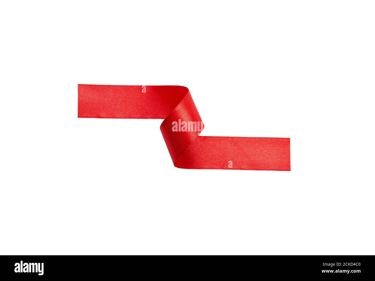 Ein rotes Band curl, drehen isoliert gegen einen weißen Hintergrund. Stockfoto