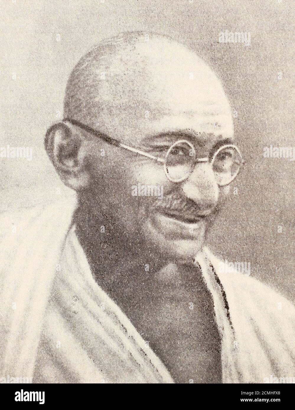 Mahatma Gandhi 1921. Mohandas Karamchand Gandhi (2. Oktober 1869 – 30. Januar 1948) war ein indischer Anwalt, antikolonialer Nationalist und politischer Ethiker, der gewaltfreien Widerstand einstellte, um die erfolgreiche Kampagne für Indiens Unabhängigkeit von der britischen Herrschaft anzuführen, und wiederum Bewegungen für Bürgerrechte und Freiheit auf der ganzen Welt inspirierte. Der Ehrentitel Mahātmā (Sanskrit: 'Great-souled', 'Venterable'), der 1914 erstmals in Südafrika bei ihm eingesetzt wurde, wird heute weltweit eingesetzt. Stockfoto