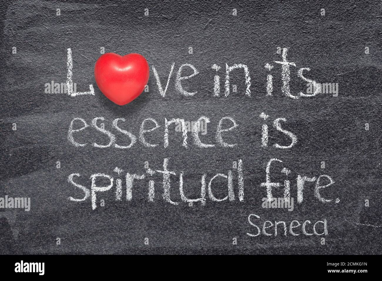 Liebe in ihrem Wesen ist spirituelles Feuer - Zitat von Antike römische Philosoph Seneca auf Tafel geschrieben Stockfoto