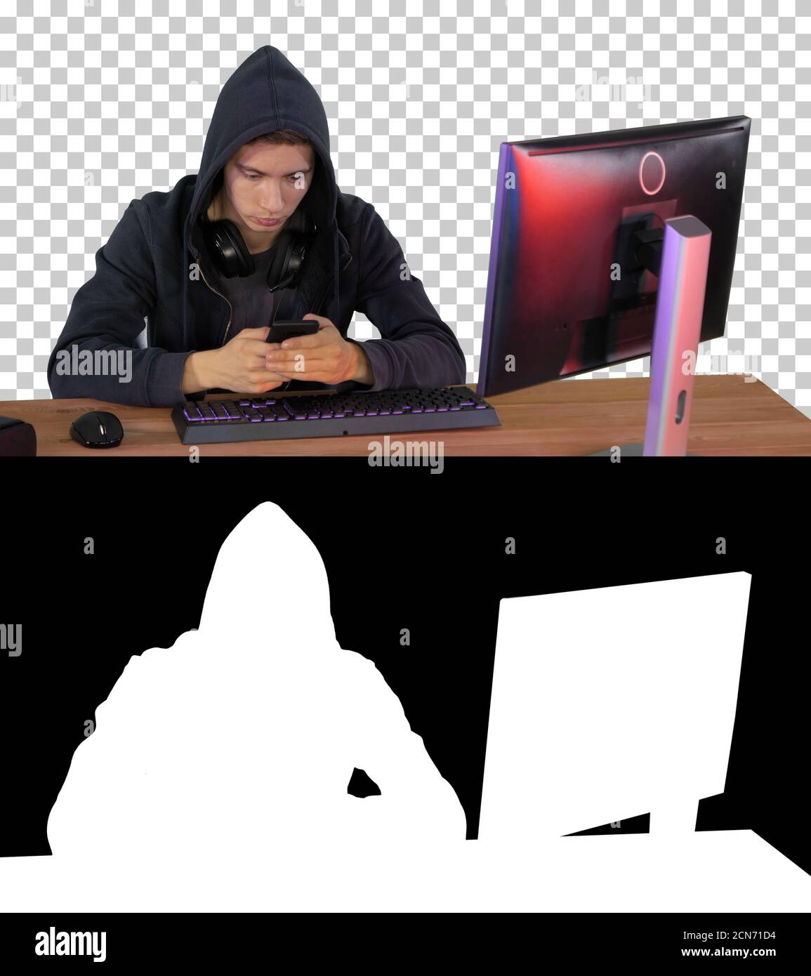 Hooded Hacker mit Laptop und Smartphone, Alpha Channel mit Si Stockfoto