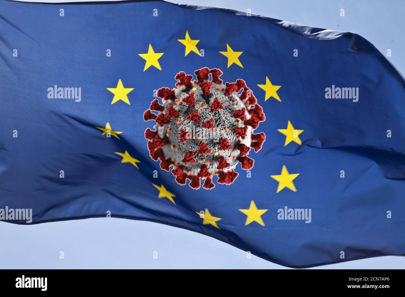 Fotomontage, europäische Flagge im Wind mit Coronvirus, Pandemie in der Europäischen Union Stockfoto