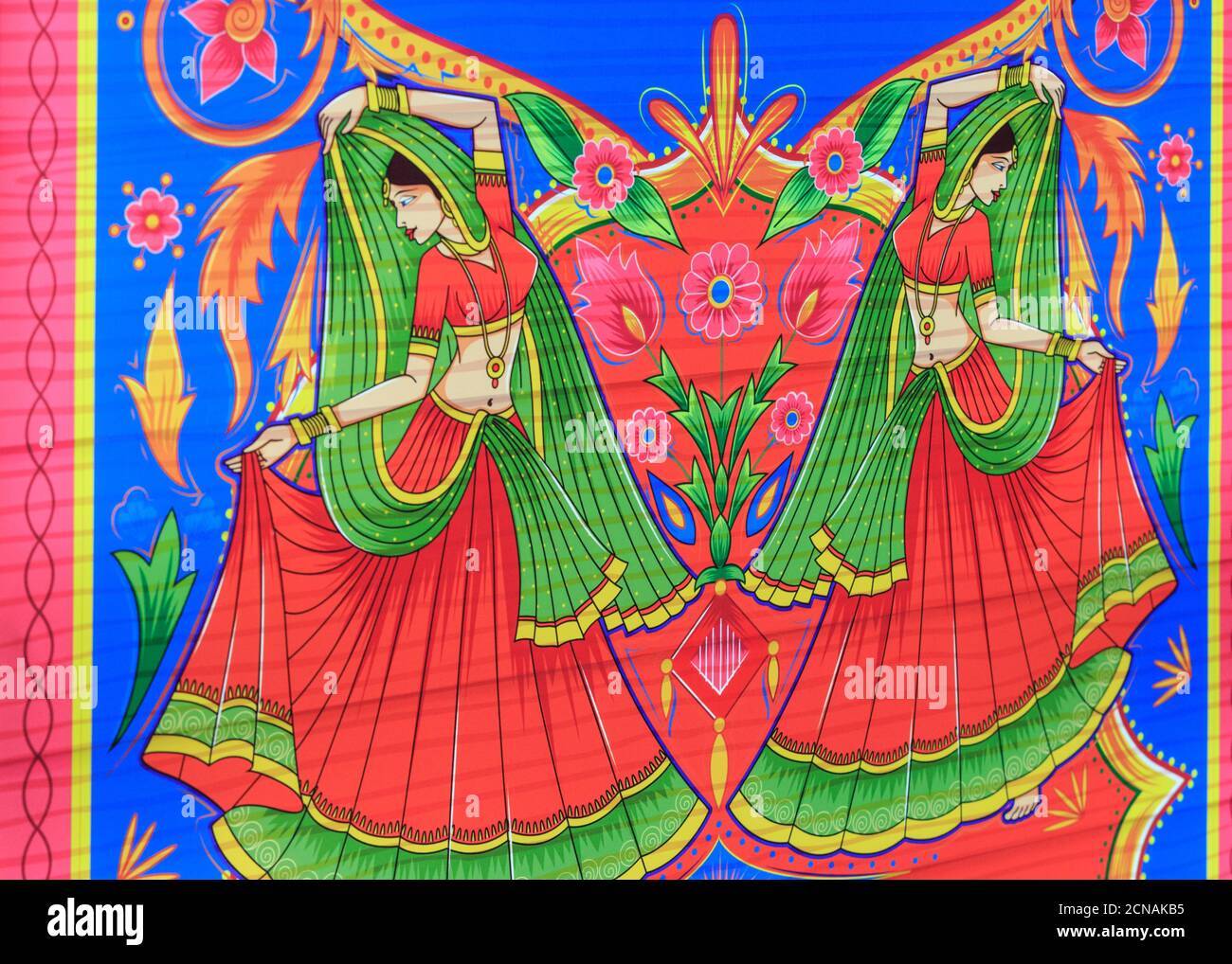 Dekorative Rajastani indische Zeichnung von Tänzerinnen in bunten Saris Stockfoto