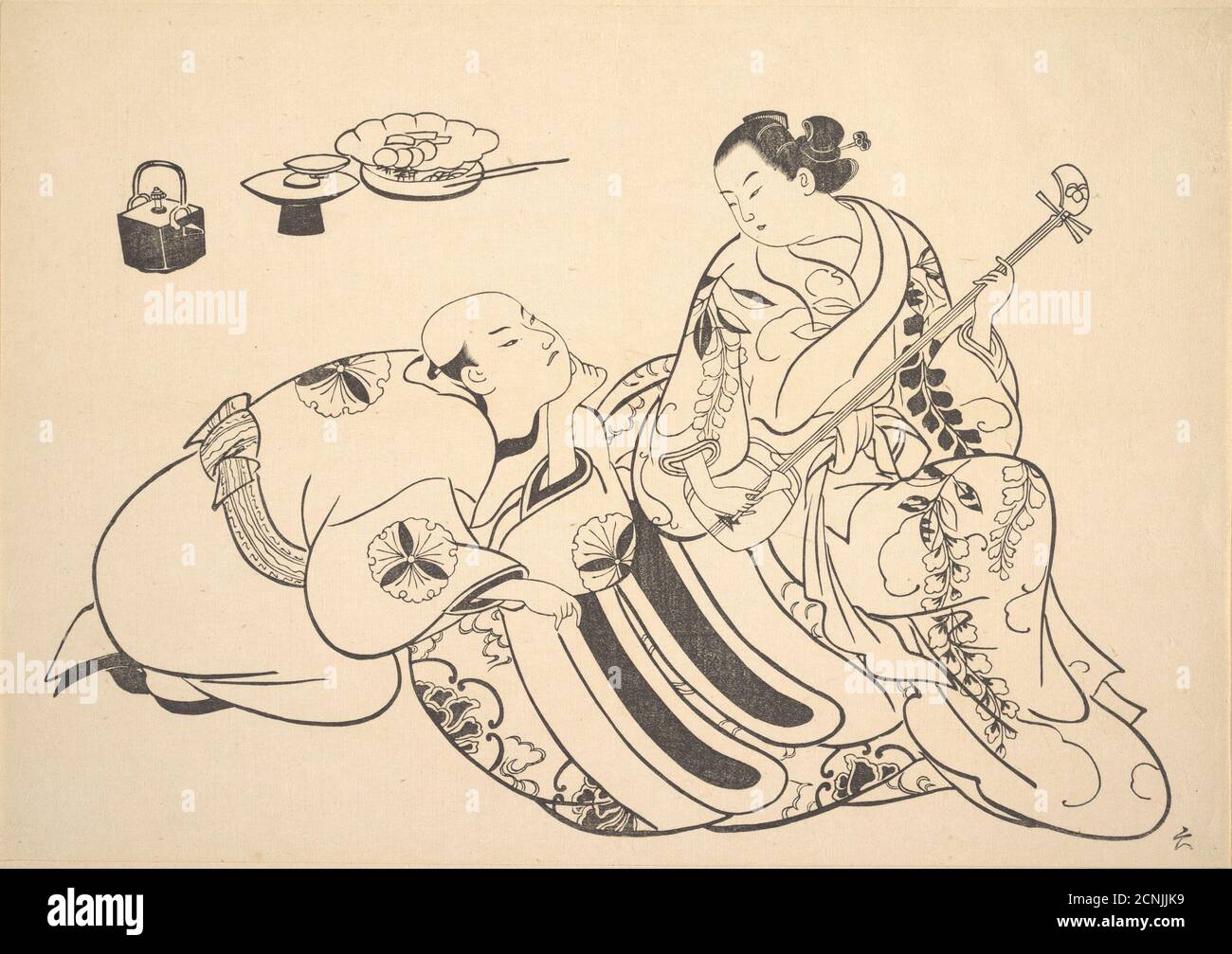 Eine Oiran spielt die Shamisen zu einem jungen Mann kniet an ihrer Seite in rapt Aufmerksamkeit. Stockfoto