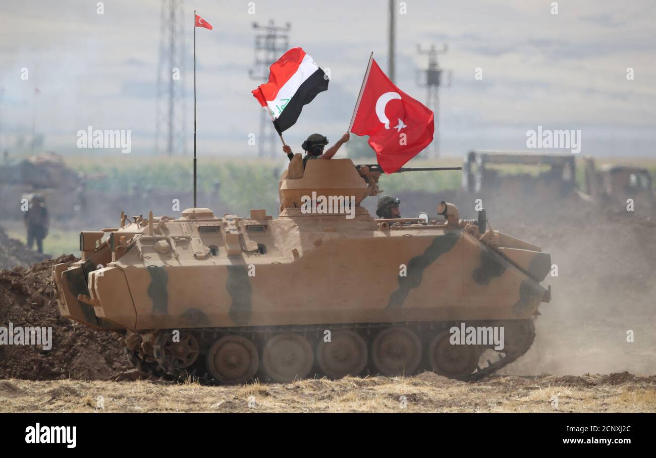 Türkische und irakische Truppen sind während einer gemeinsamen Militärübung nahe der türkisch-irakischen Grenze in Silopi, Türkei, am 26. September 2017 abgebildet. REUTERS/Umit Bektas Stockfoto