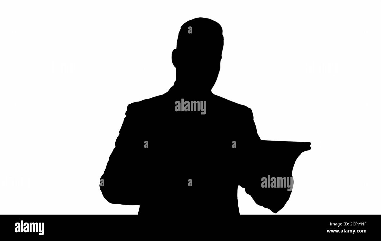 Silhouette Geschäftsmann präsentiert von der Tablette. Stockfoto