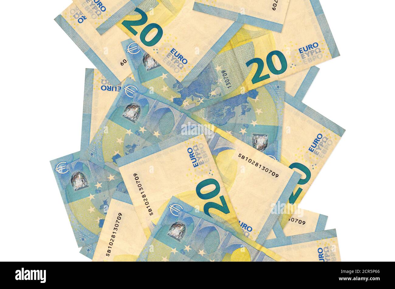 20 Euro Scheine fliegen isoliert auf weiß. Viele Banknoten fallen mit weißem Kopieplatz auf der linken und rechten Seite Stockfoto