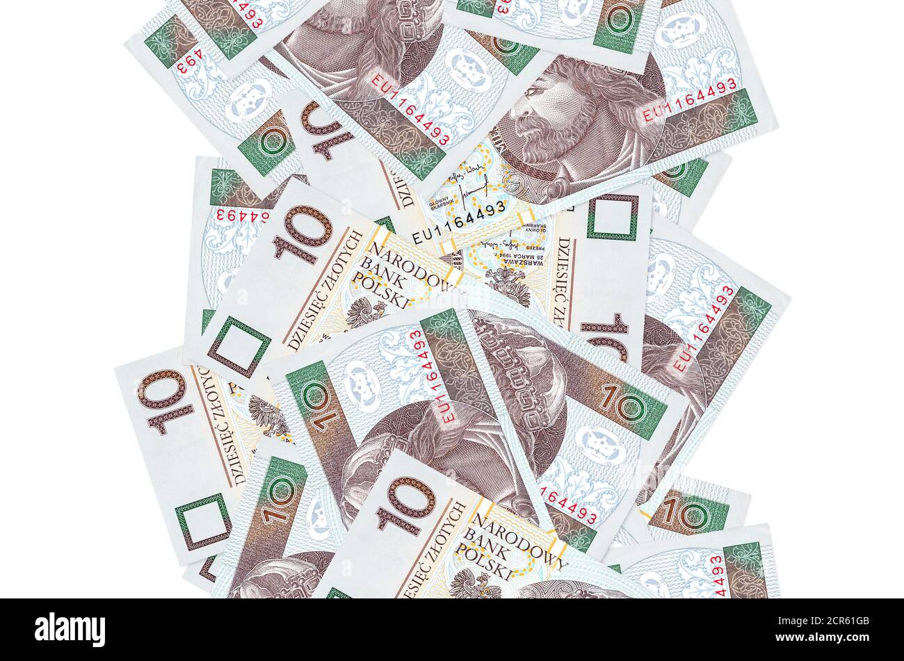 10 polnische Zloty-Scheine fliegen isoliert auf Weiß. Viele Banknoten fallen mit weißem Kopieplatz auf der linken und rechten Seite Stockfoto